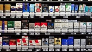 a shelf with cigarettes on it