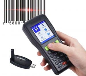 a hand holding a barcode scanner 