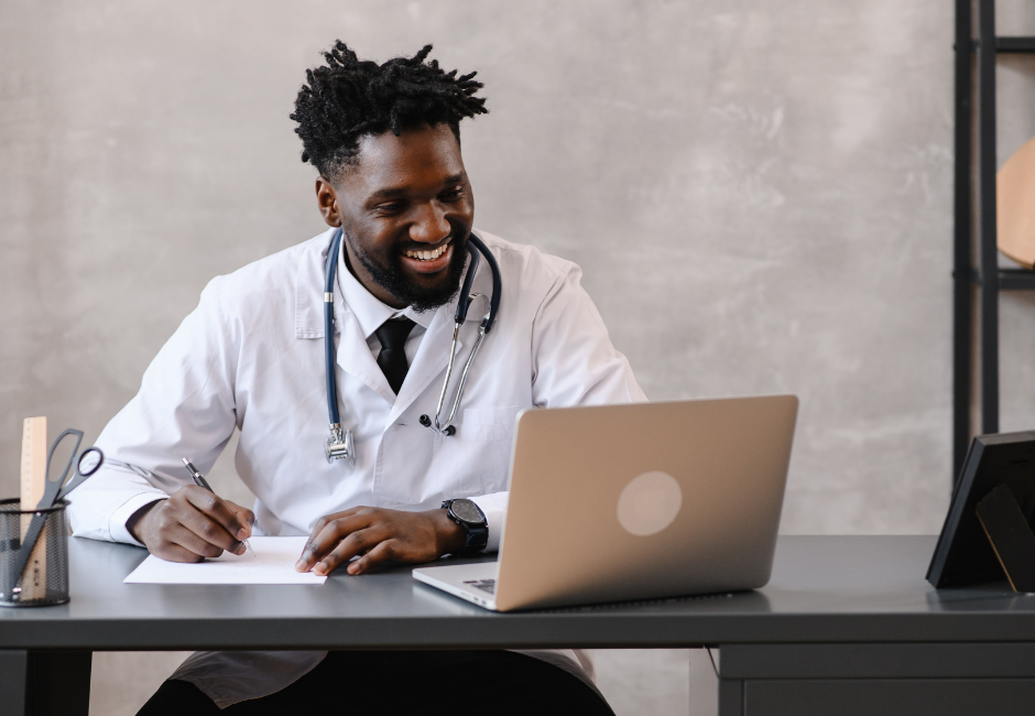 Doctor performing a telehealth visit on laptop